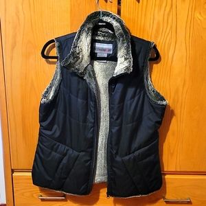 Womens black vest with faux fur lining. Size M.
